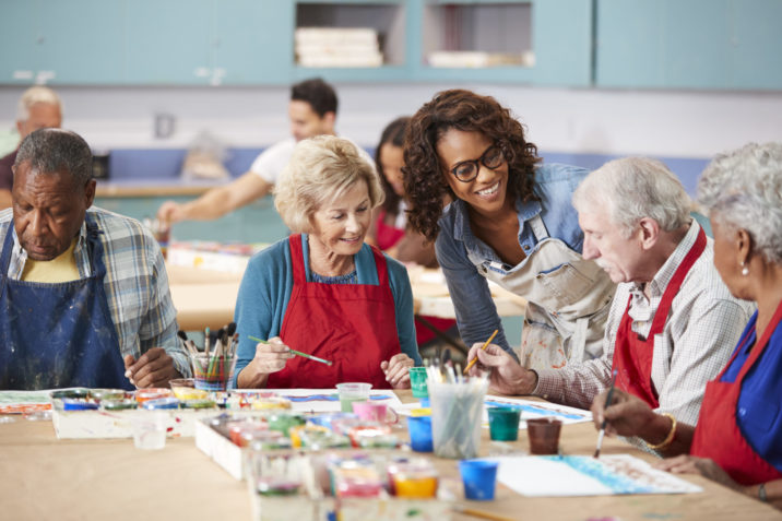 Old people in art workshop