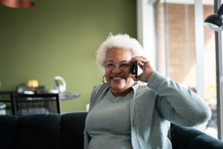 Old woman talking on phone