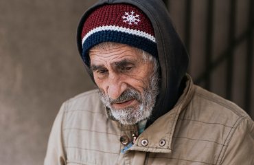 homless man portrait with little smile
